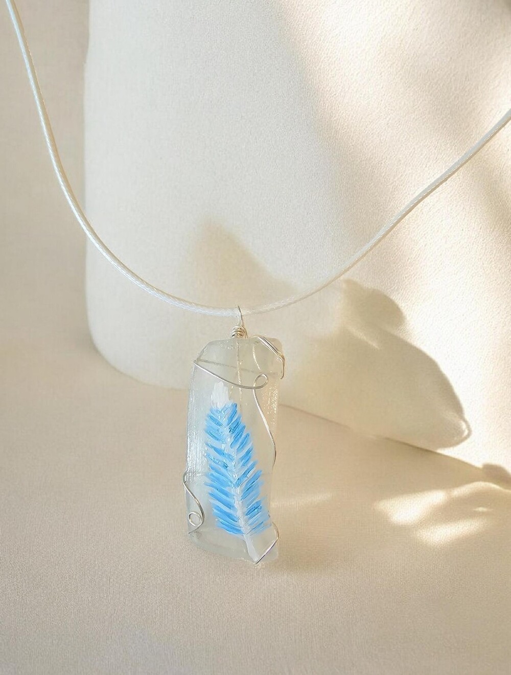 Hand-Painted Blue Jay Feather Necklace on Genuine Seaglass